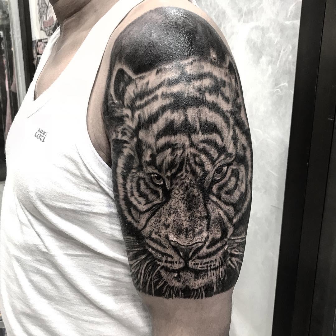 Tattoo by @kabirray11 — realism, black_and_grey
