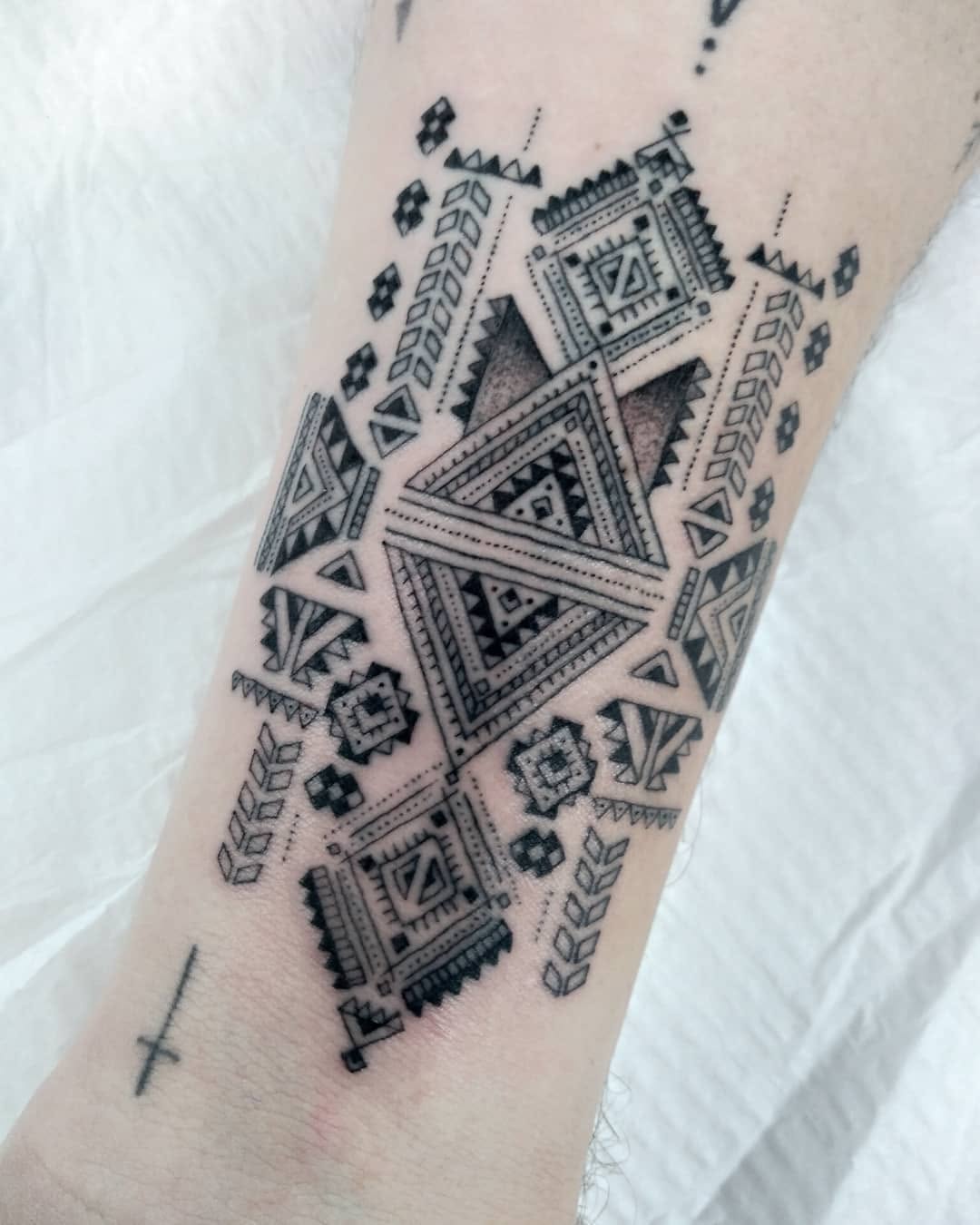 Tattoo by @blackbird_okinawa — geometric, dotwork