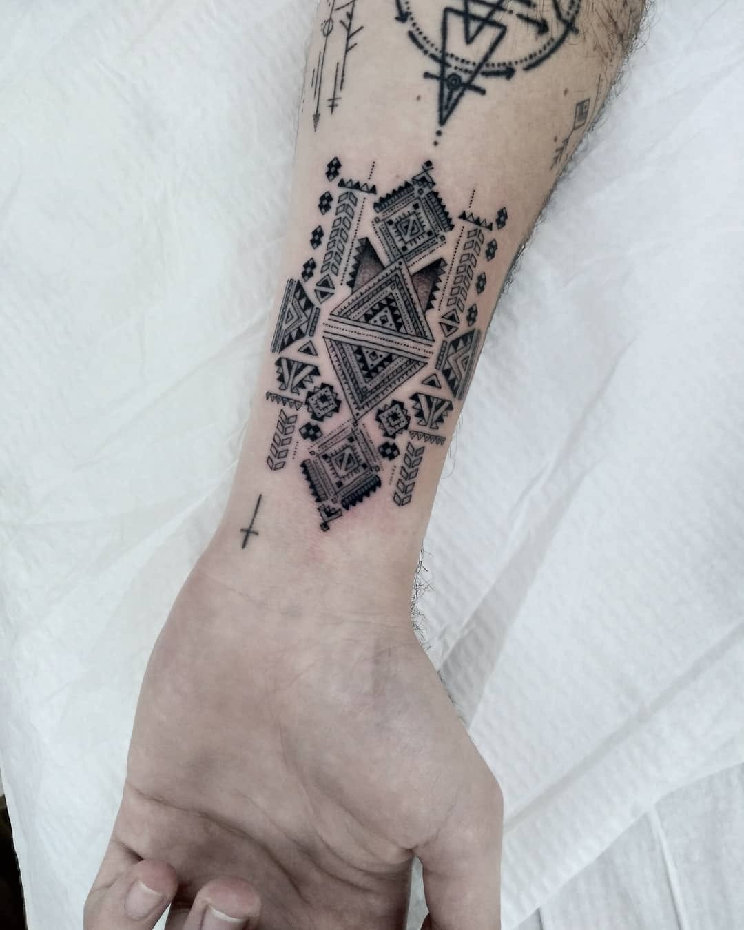 Tattoo by @blackbird_okinawa — geometric, dotwork