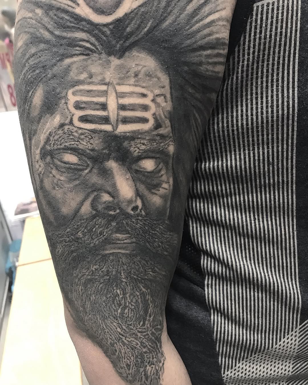 Tattoo by @kabirray11 — realism, black_and_grey
