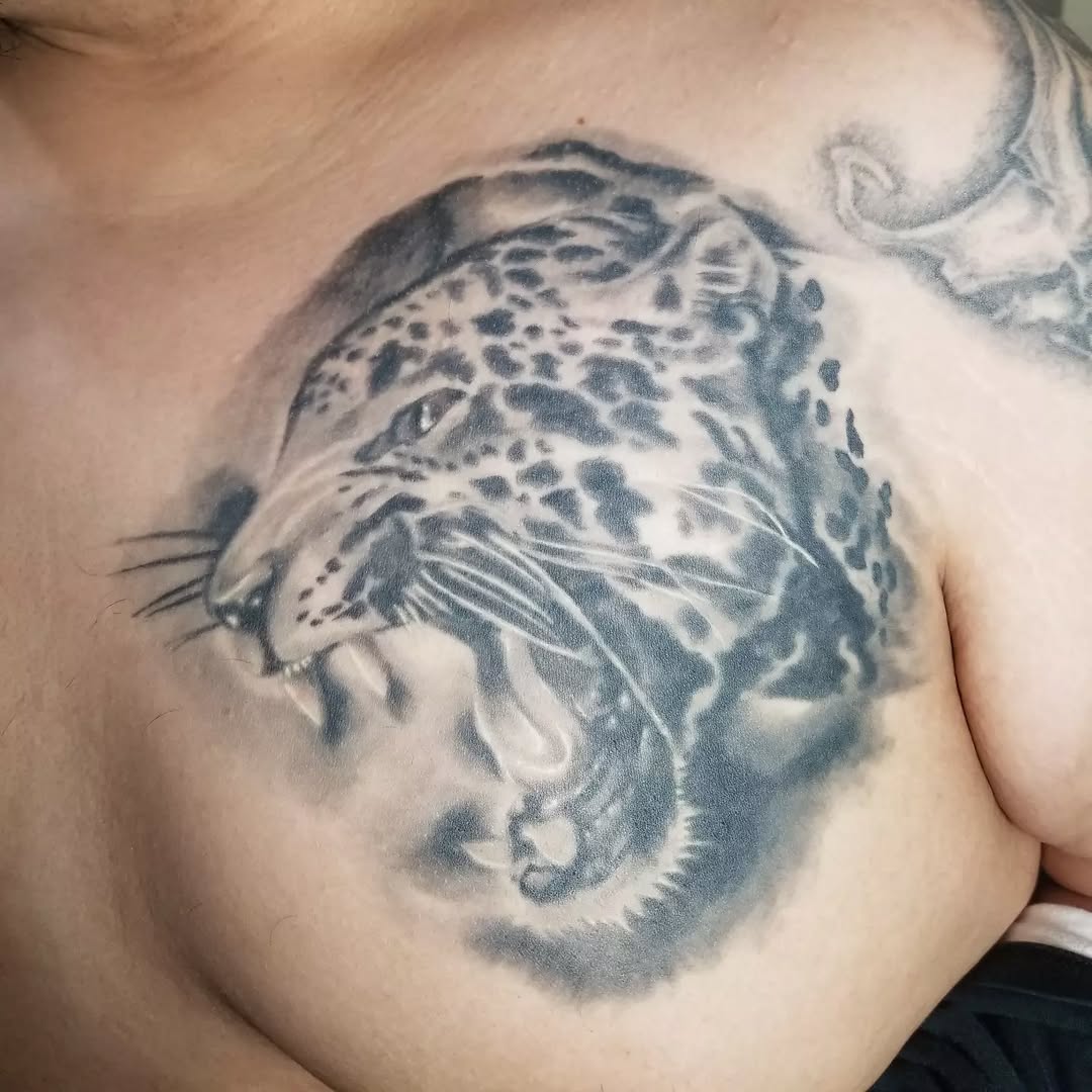 Tattoo by @tattoos.by.miguelc — realism, black_and_grey