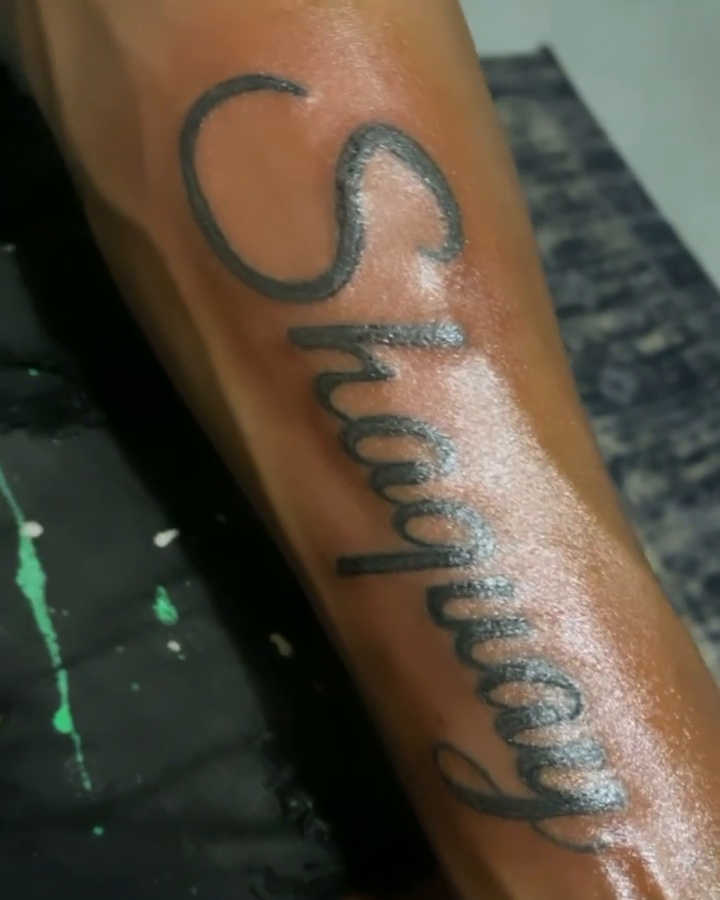 Tattoo by @tattedbyching — lettering_script, black_and_grey