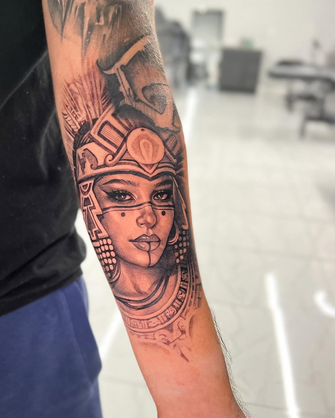 Tattoo by @joey_hella — realism, black_and_grey