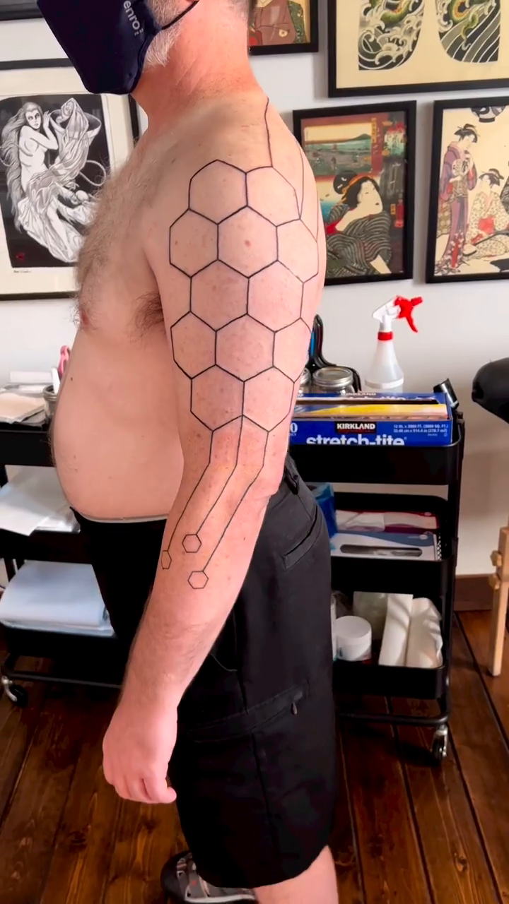 Tattoo by @crash_tattooer — geometric, illustrative