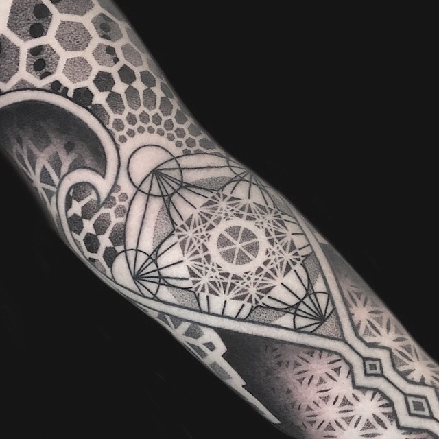 Tattoo by @setharcane — geometric, dotwork