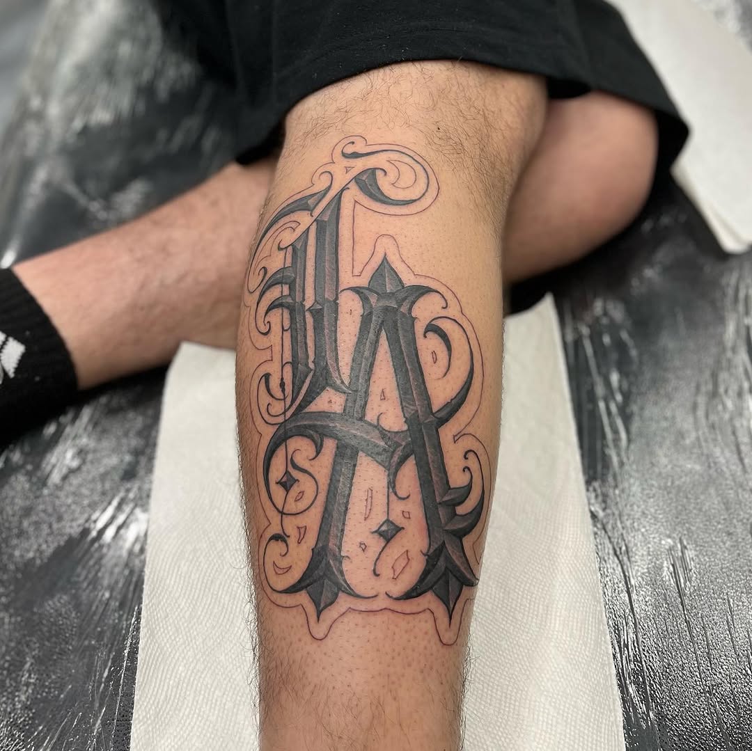 Tattoo by @nickysix86 — lettering_script, blackwork