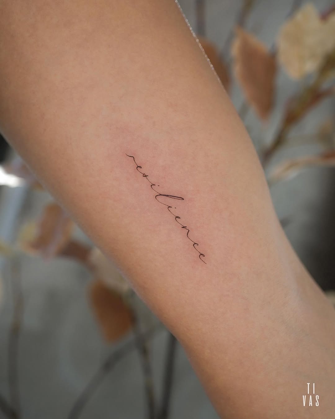 Tattoo by @tivas — lettering_script, fine_line