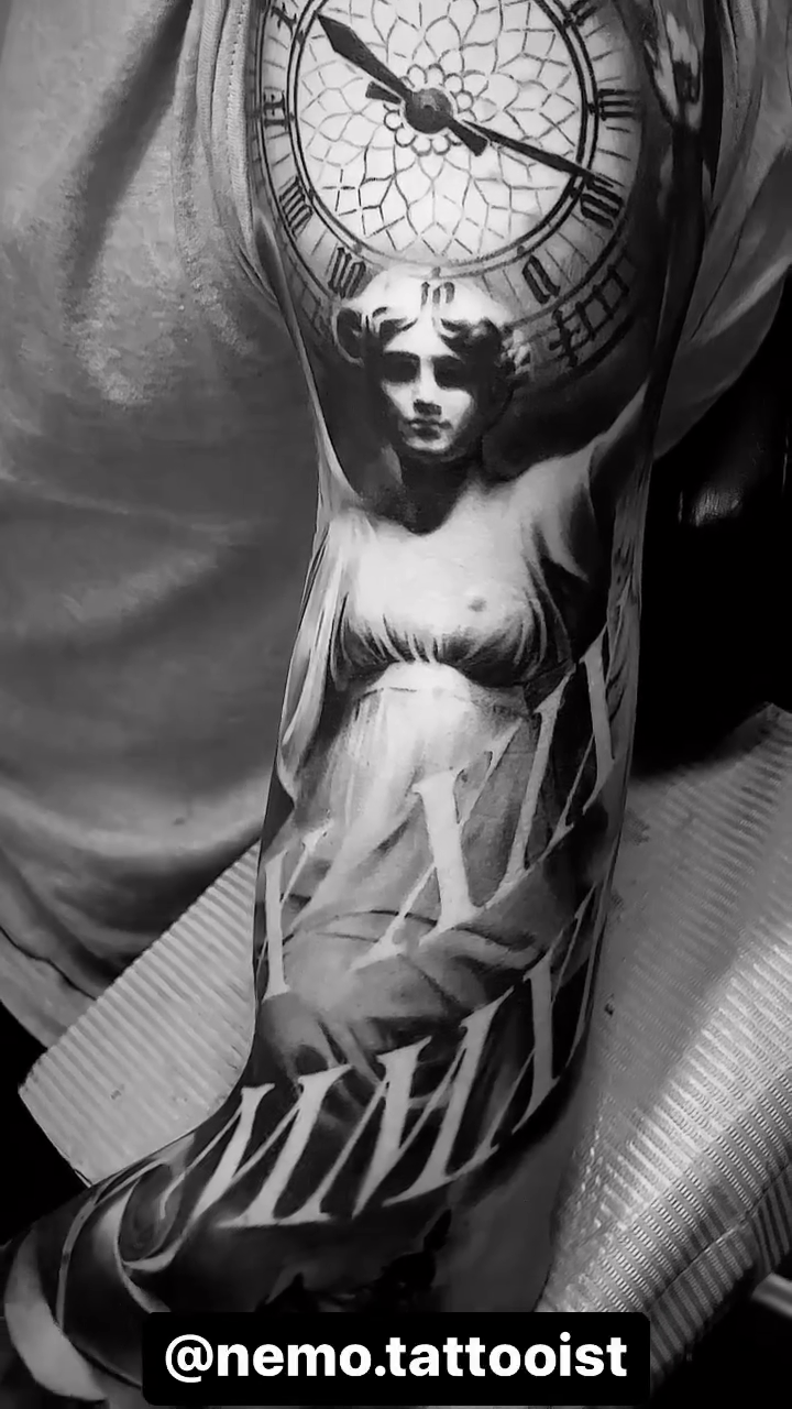 Tattoo by @nemo.tattooist — realism, black_and_grey