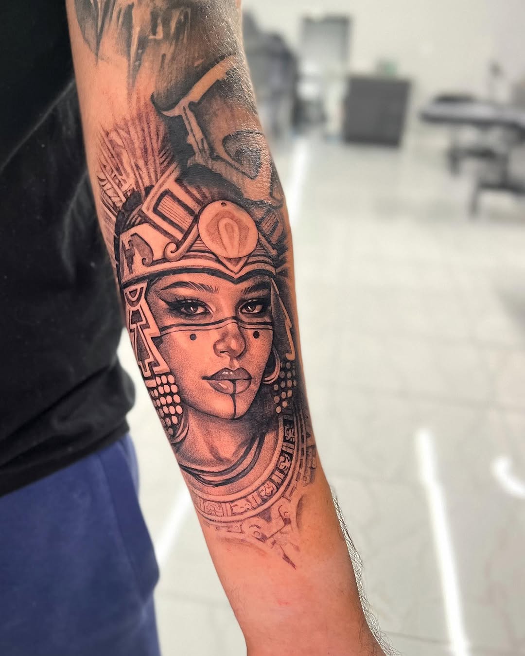 Tattoo by @joey_hella — realism, black_and_grey