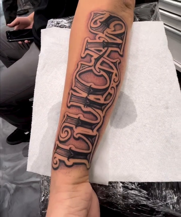 Tattoo by @nickysix86 — lettering_script, black_and_grey