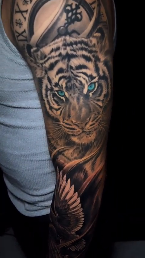 Tattoo by @mannytattooartist โ realism, black_and_grey
