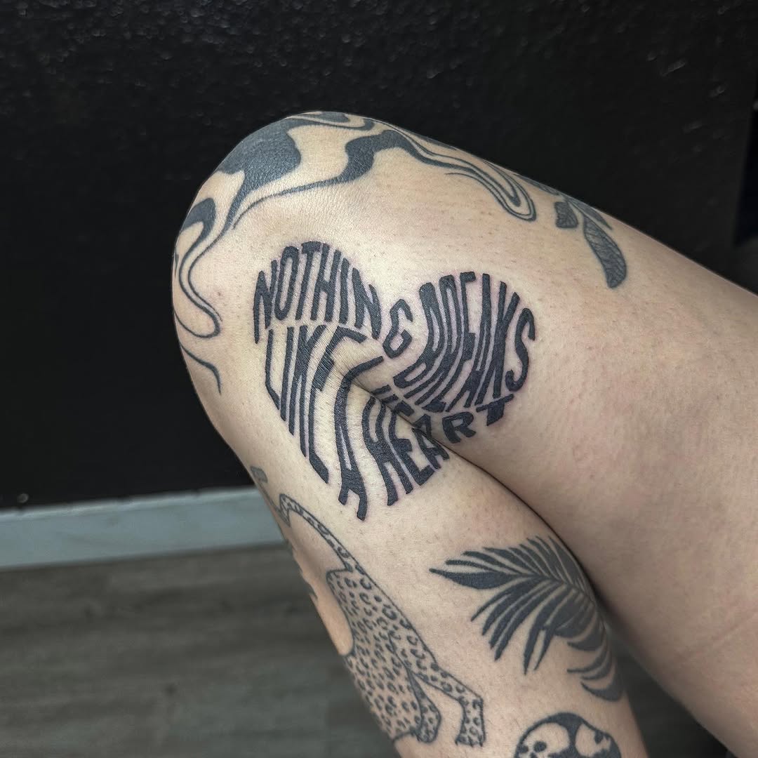 Tattoo by @k8.tat — lettering_script, blackwork