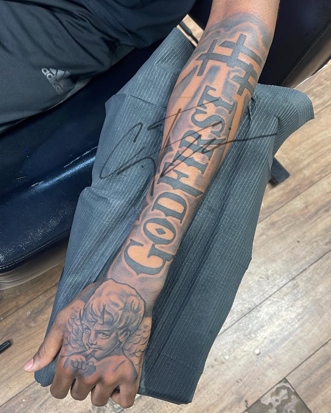 Tattoo by @crea8tive_director โ lettering_script, black_and_grey