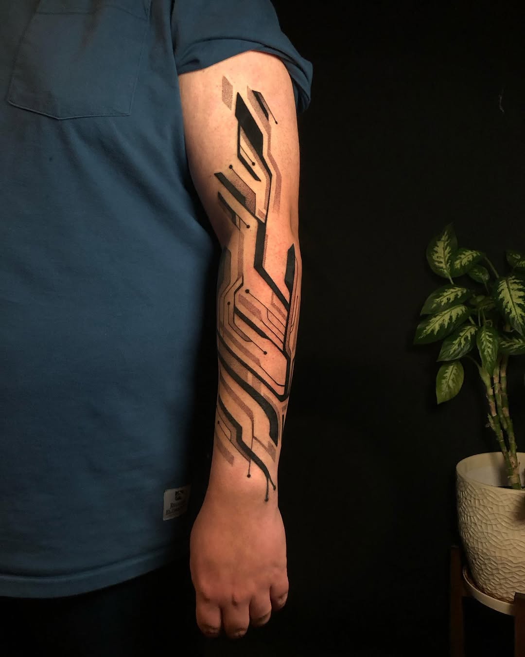 Tattoo by @orb_ink — geometric, illustrative