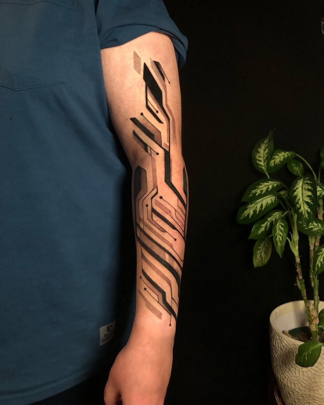 Tattoo by @orb_ink — geometric, illustrative