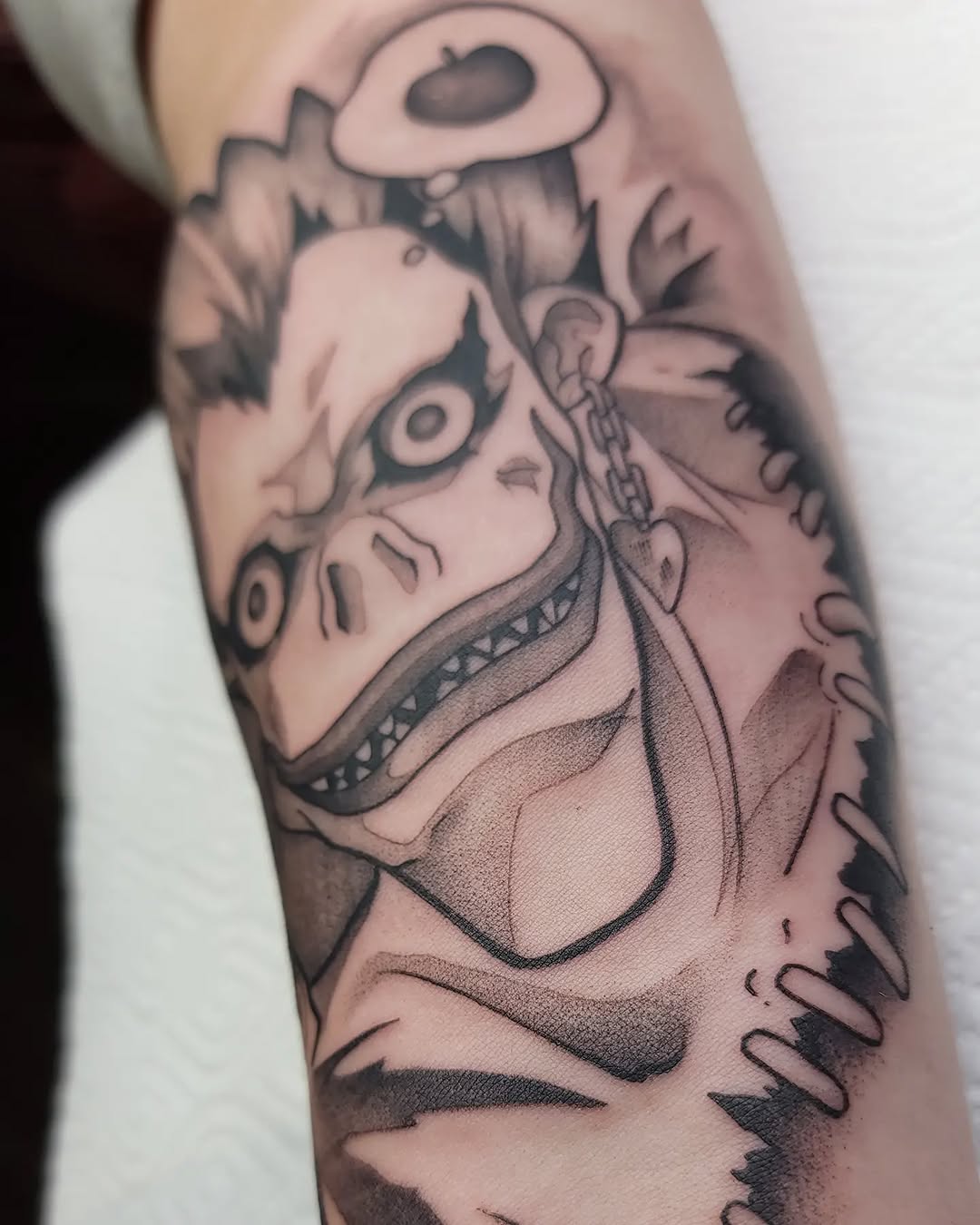 Tattoo by @gargeist — anime, black_and_grey
