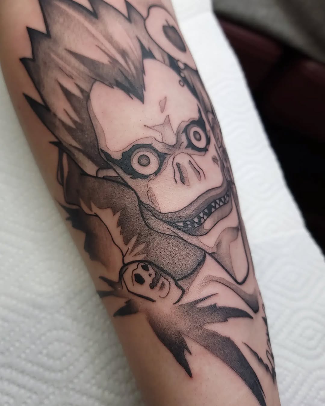 Tattoo by @gargeist — anime, black_and_grey