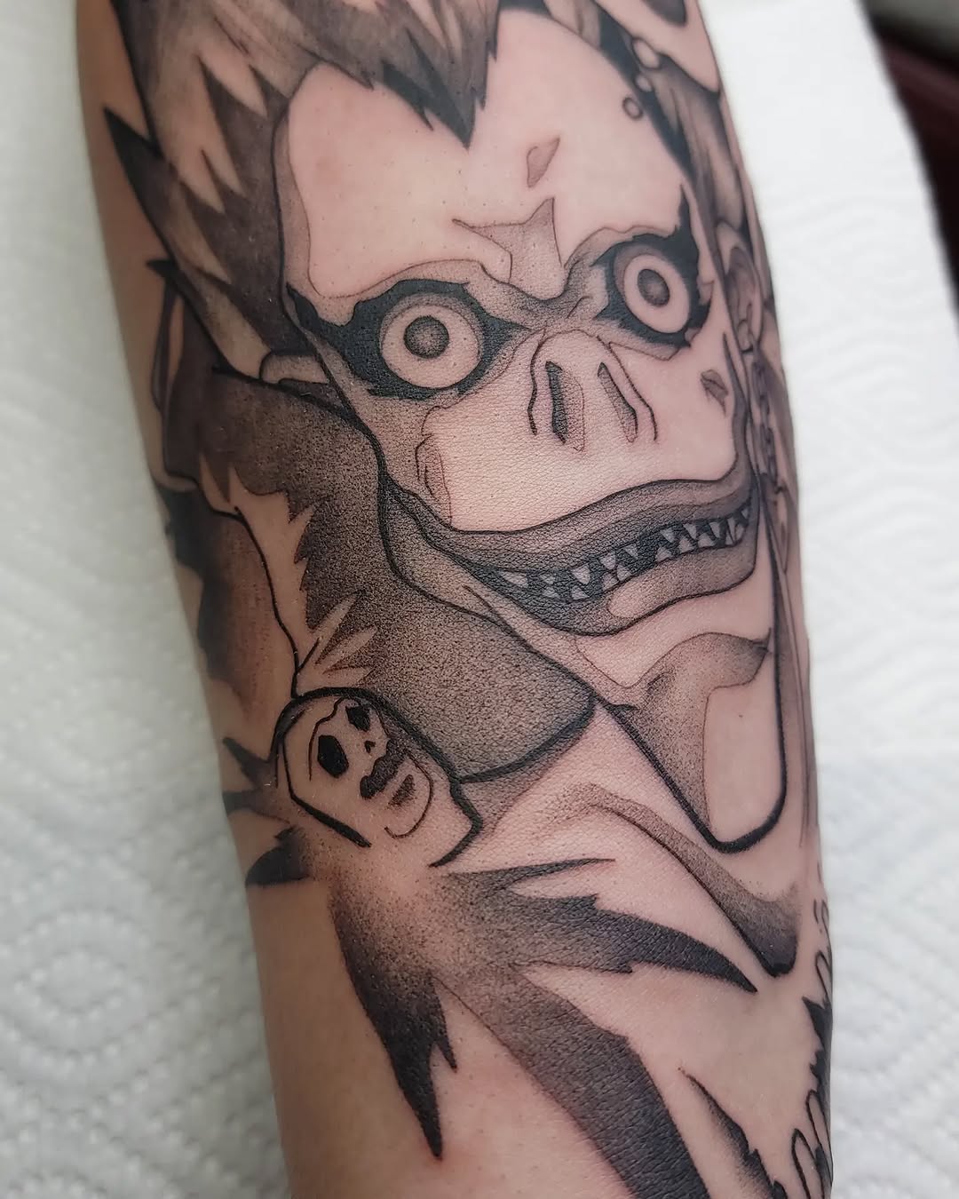 Tattoo by @gargeist — anime, black_and_grey