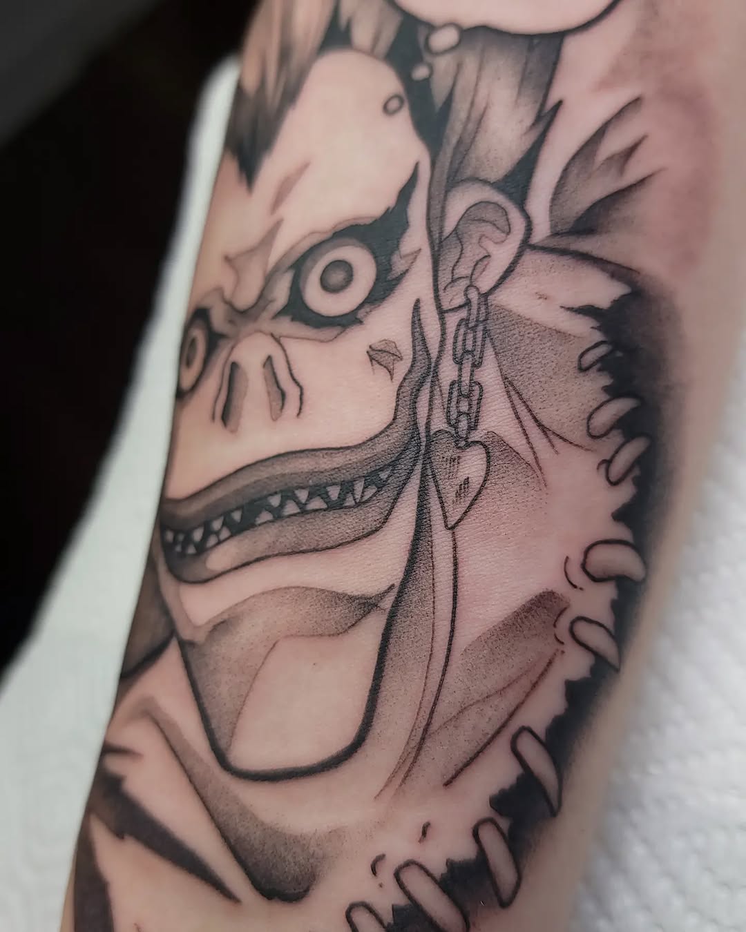 Tattoo by @gargeist — anime, black_and_grey