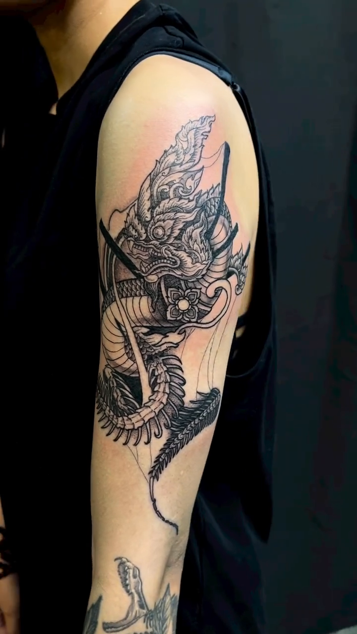 Tattoo by @nil.tattooo — japanese_irezumi, black_and_grey