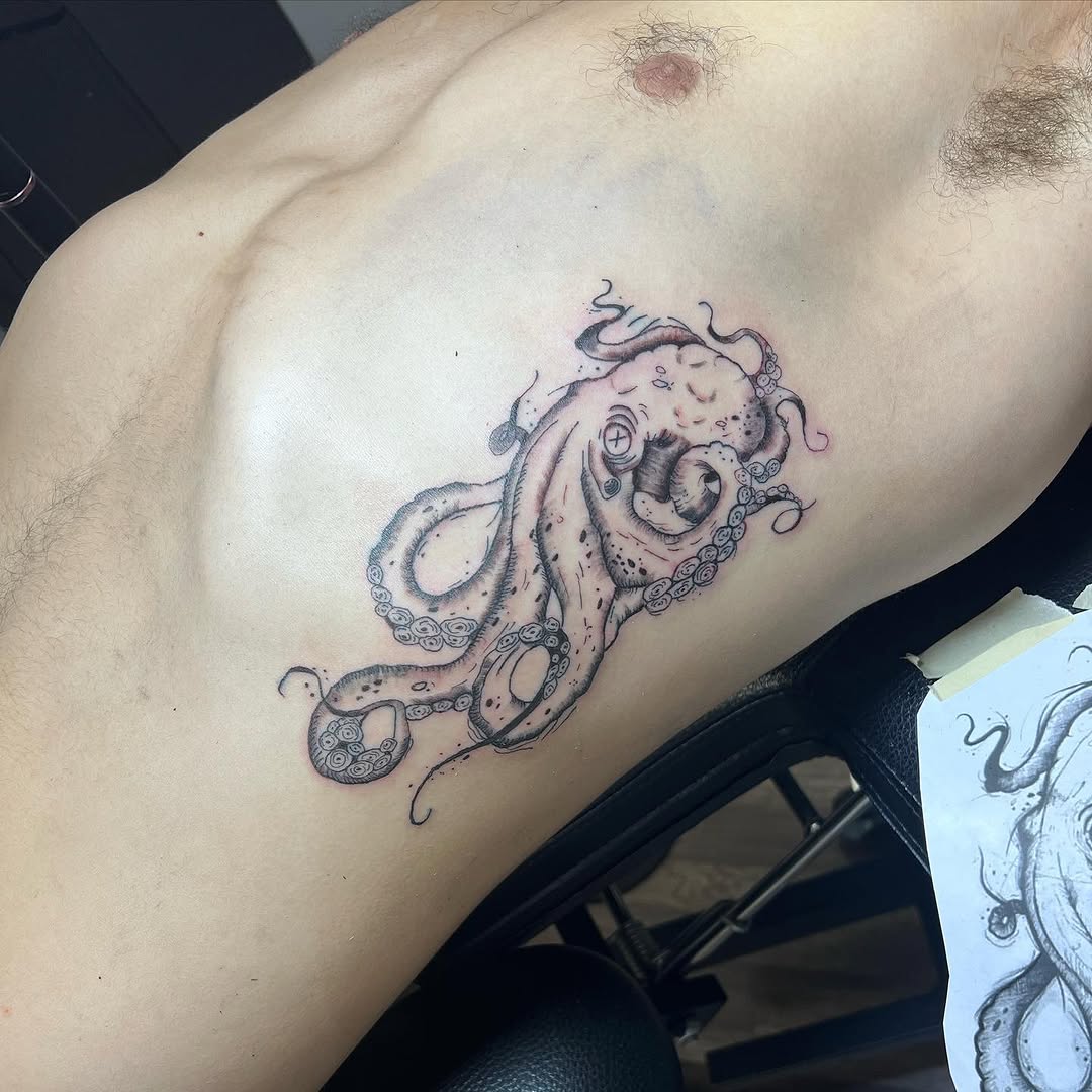 Tattoo by @jaystats03 — black_and_grey, realism