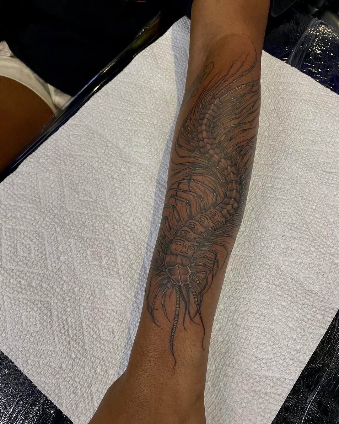 Tattoo by @l.sinatra__ — black_and_grey, dark_realism
