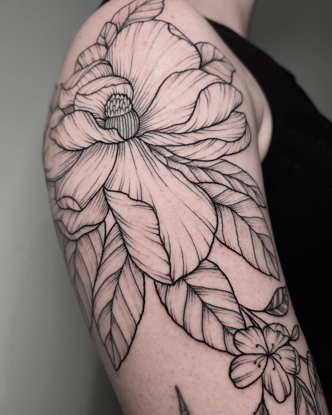 Tattoo by @shakuto_tattoos — fine_line, black_and_grey