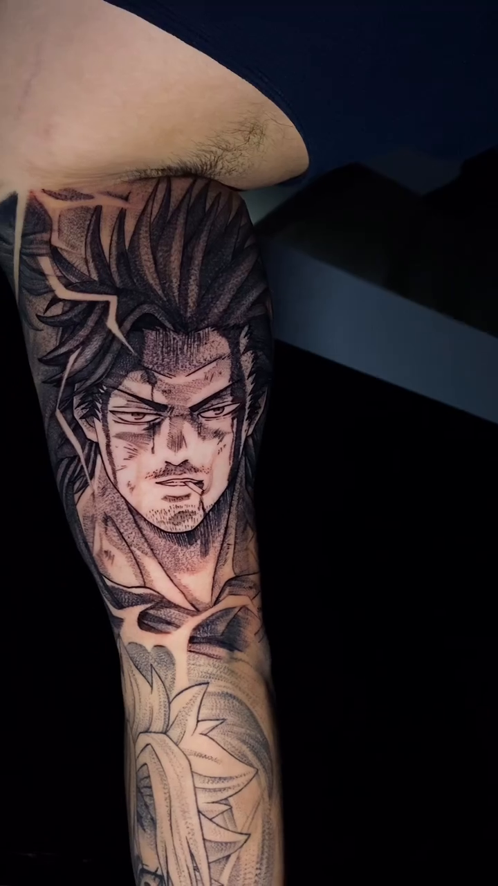 Tattoo by @john.alaw.tattoo — anime, black_and_grey