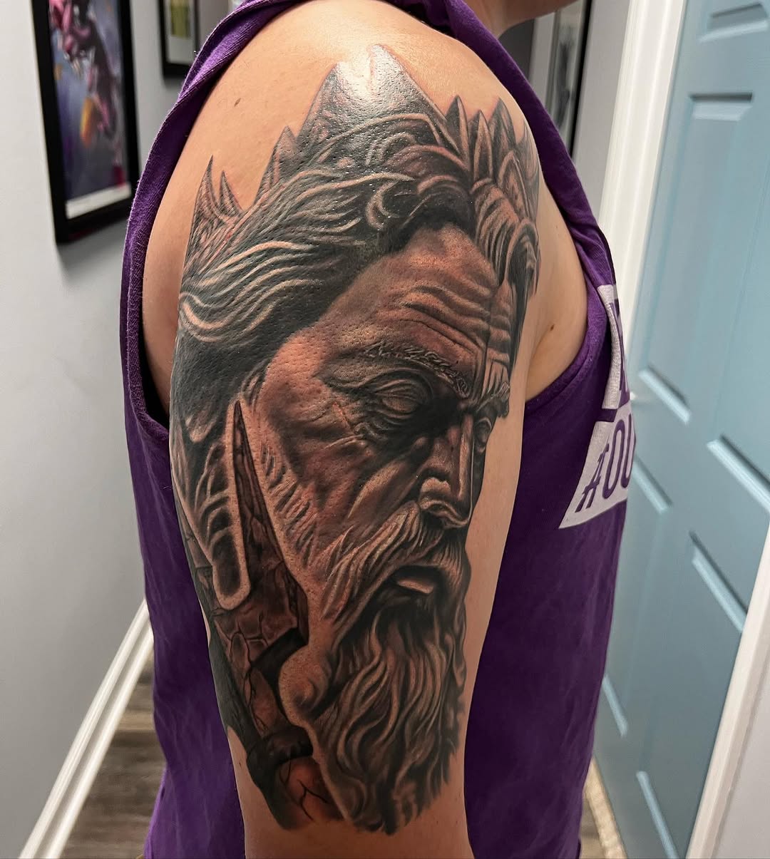 Tattoo by @garlandt35 — realism, black_and_grey