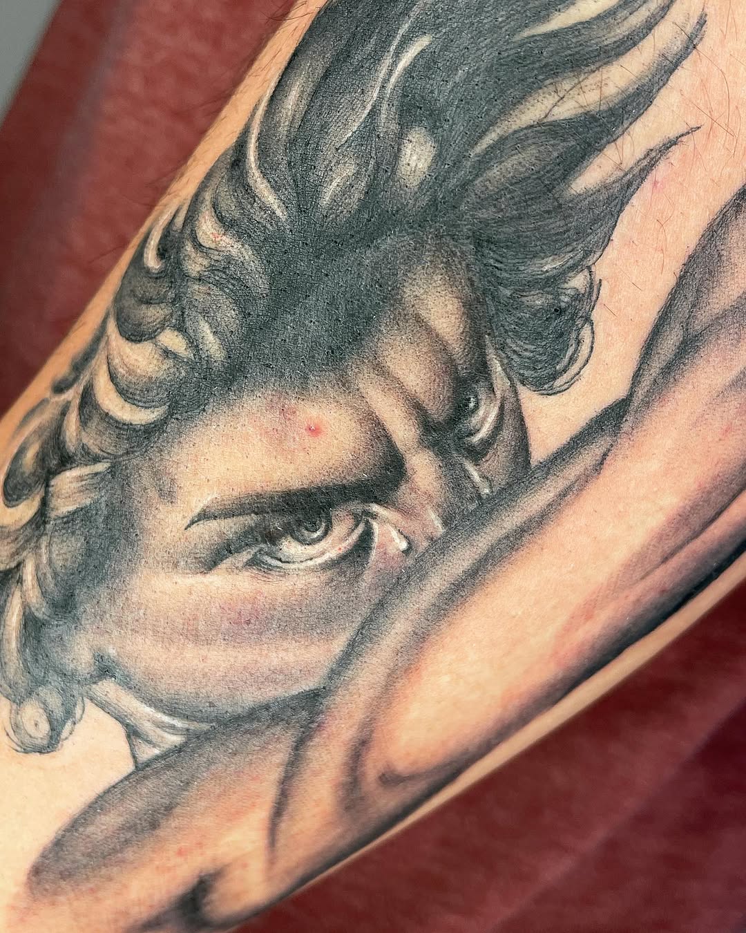 Tattoo by @hoppin.ink — realism, black_and_grey