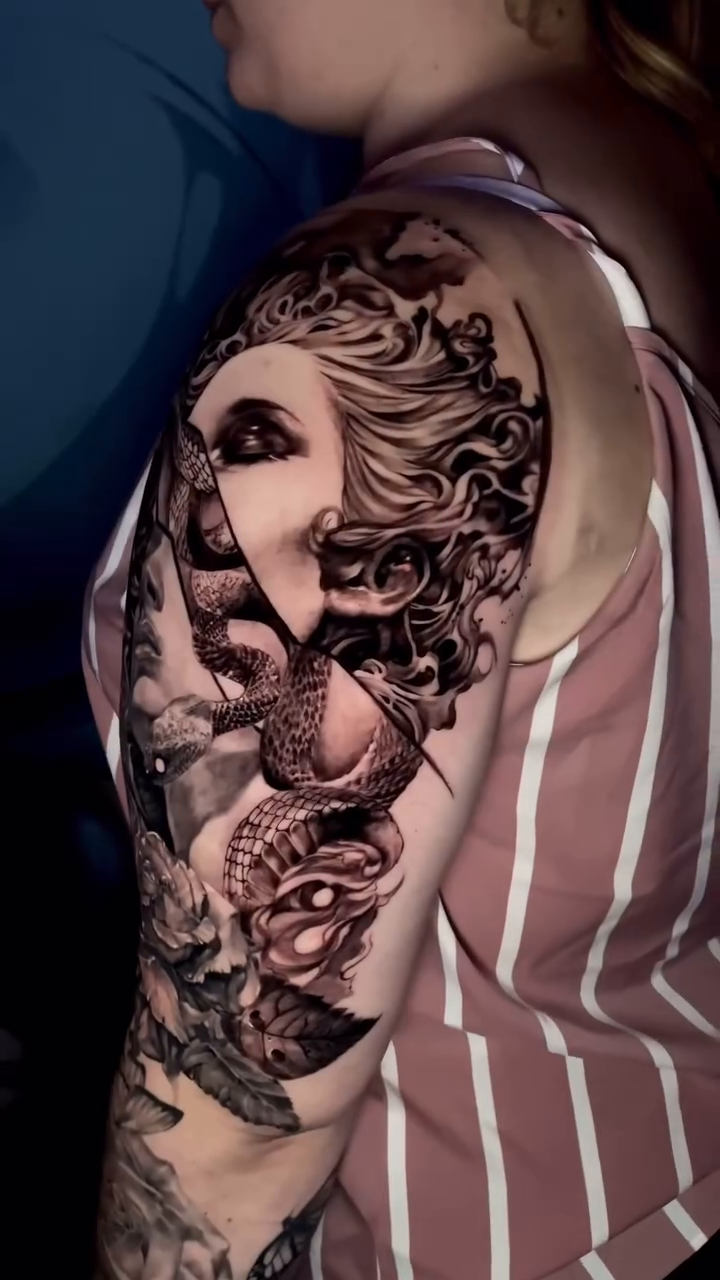 Tattoo by @necultra.tattoo — realism, black_and_grey
