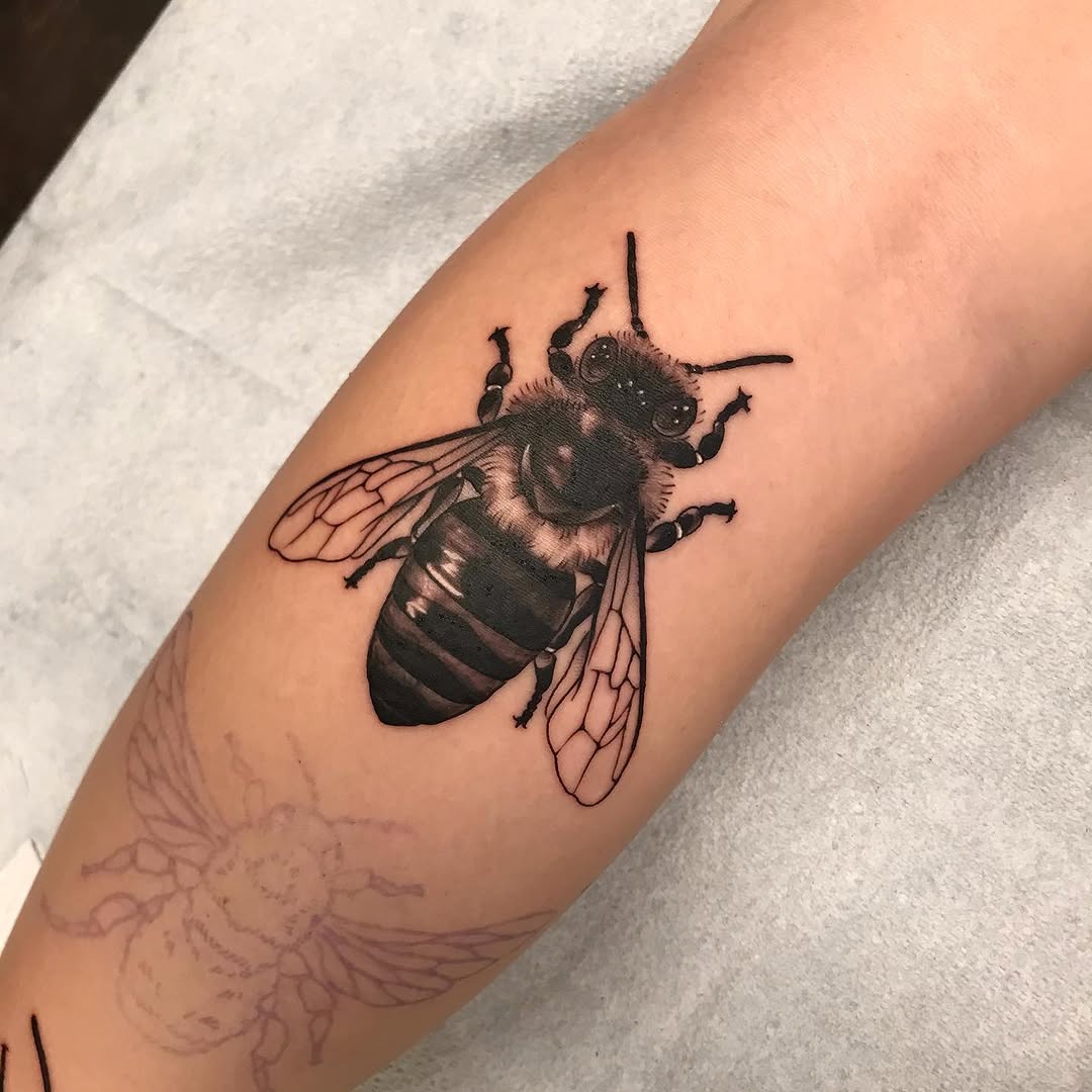 Tattoo by @velvet.snails — realism, black_and_grey