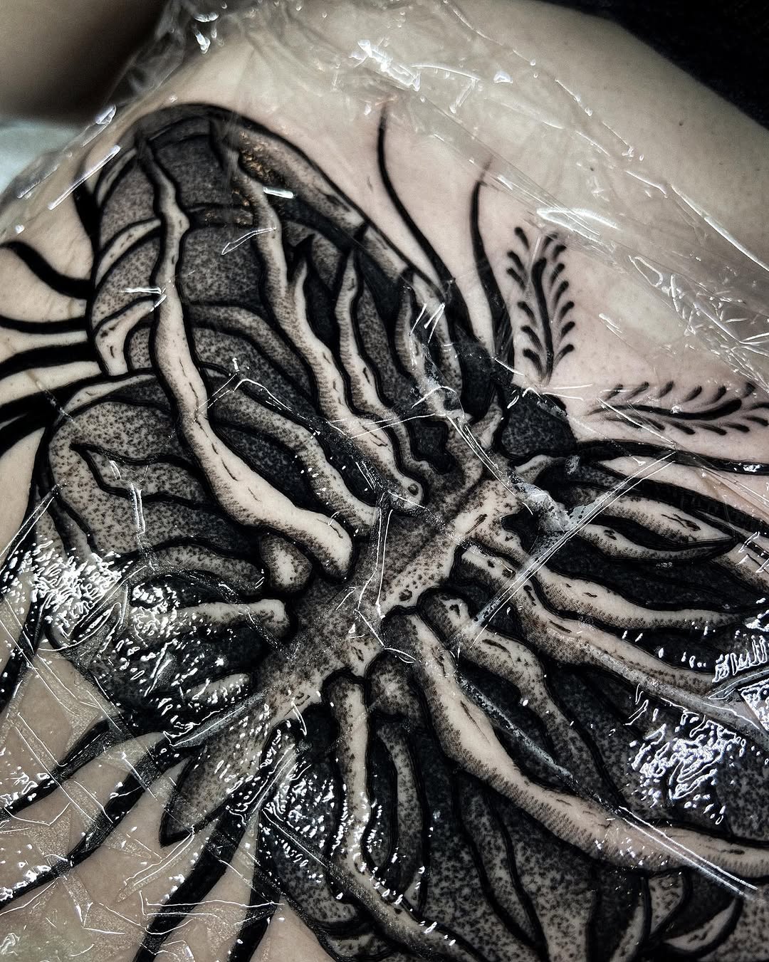 Tattoo by @bunche_tattoo โ black_and_grey, dotwork