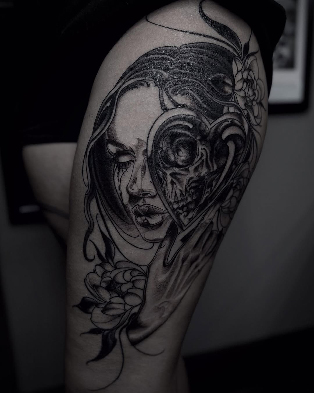 Tattoo by @lorenzotattoos — dark_realism, black_and_grey