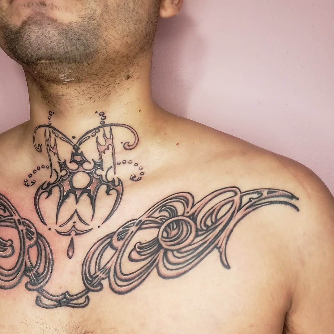 Tattoo by @chainveil.tattoo — ornamental, lettering_script