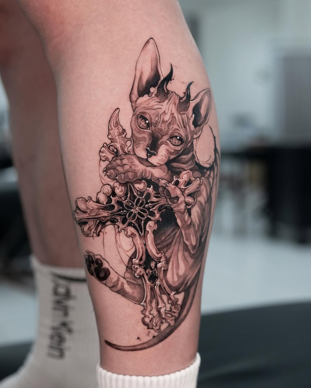 Tattoo by @yozu.tattoo — realism, black_and_grey