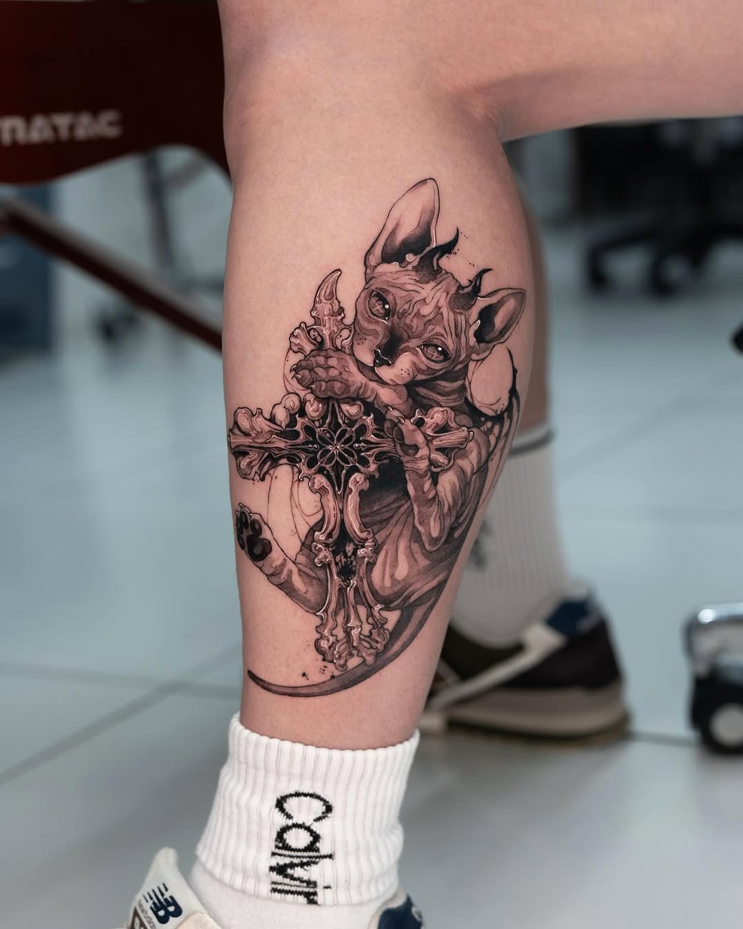 Tattoo by @yozu.tattoo — realism, black_and_grey