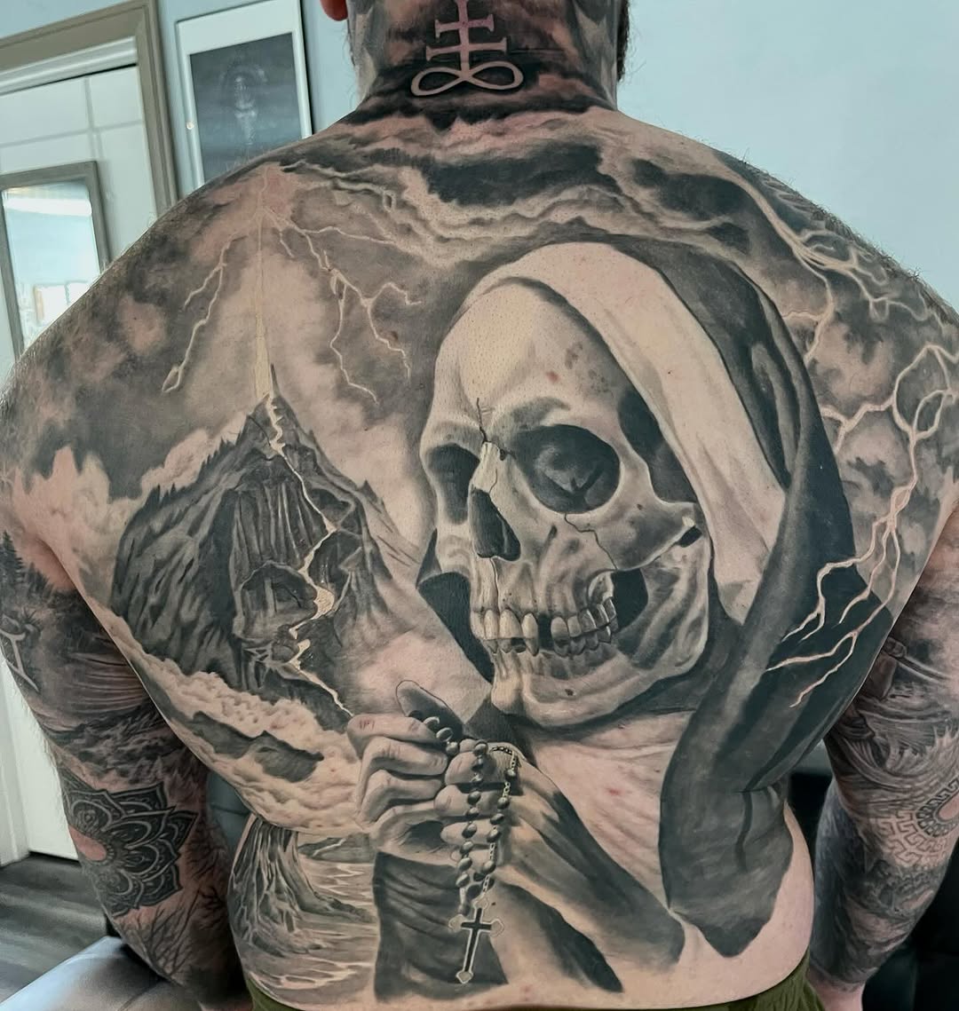 Tattoo by @tonycashtattoos — dark_realism, black_and_grey
