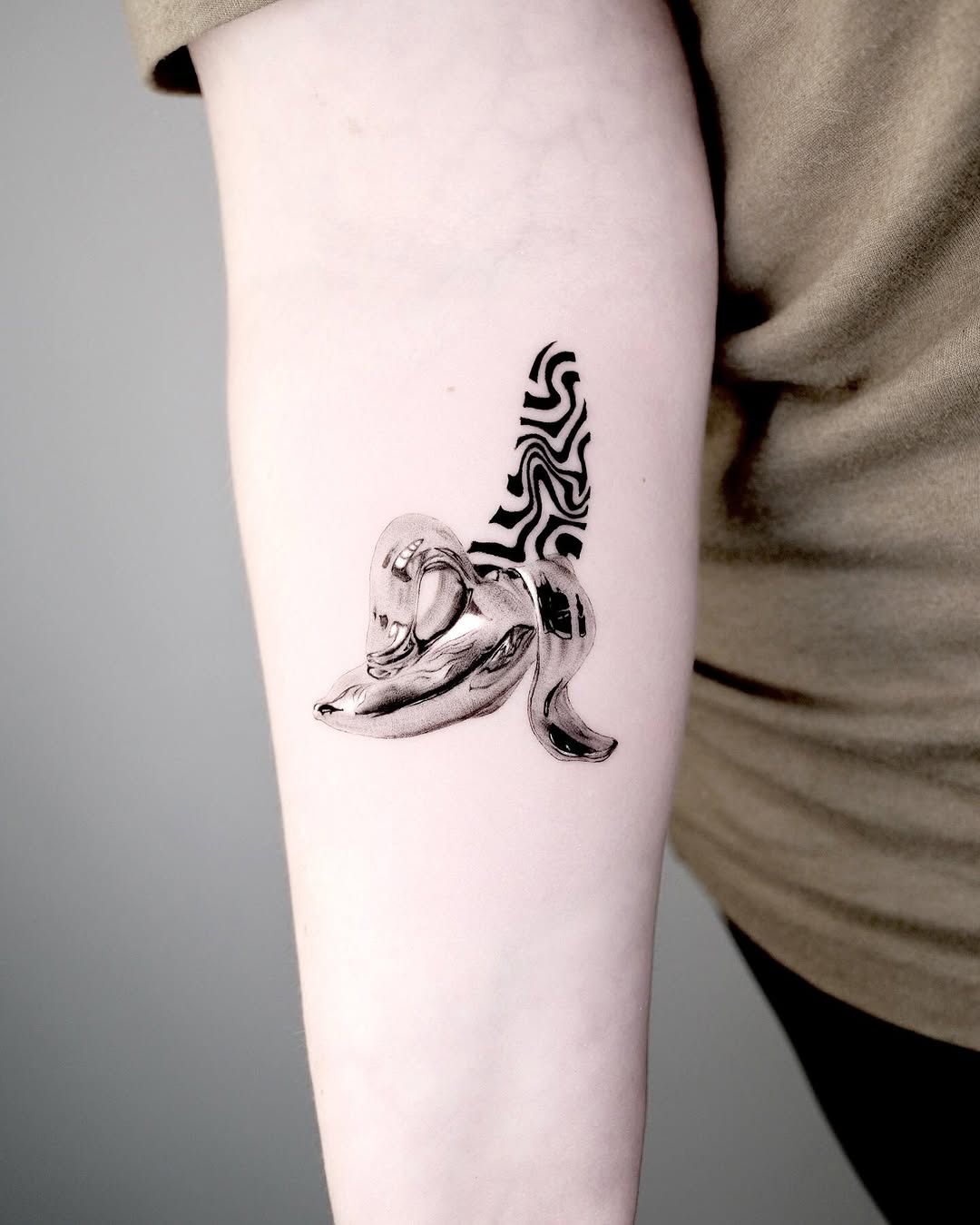 Tattoo by @tattooer.ari โ realism, illustrative