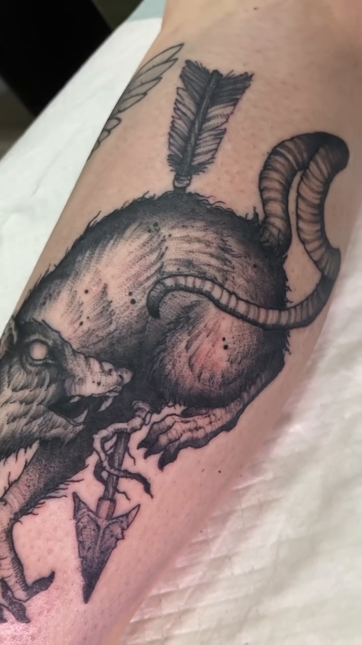 Tattoo by @trogdor_tattoo — black_and_grey, illustrative