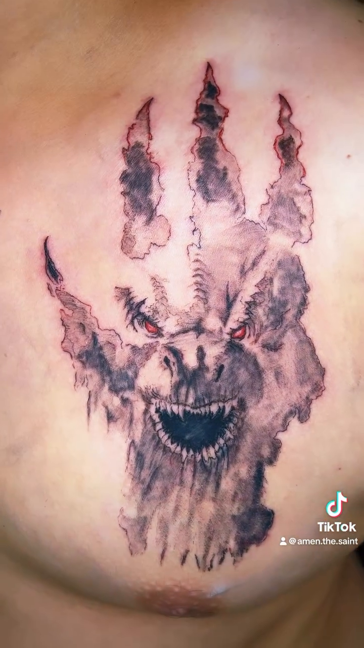 Tattoo by @saint_ink2023 — dark_realism, black_and_grey