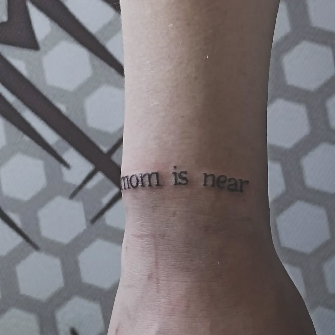 Tattoo by @dori.tatt — lettering_script, fine_line