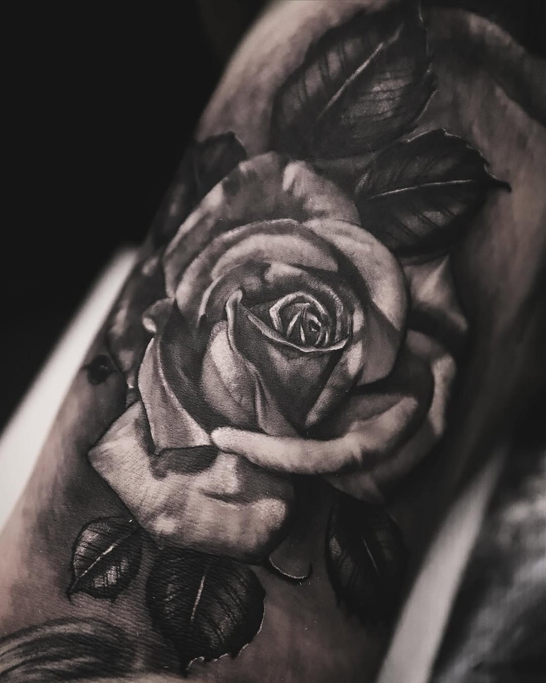 Tattoo by @officialiink.co — realism, black_and_grey