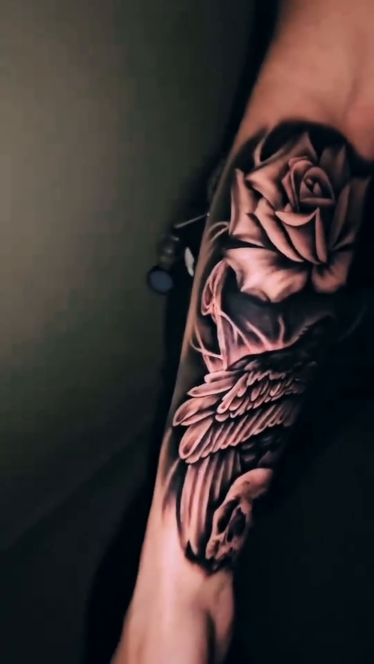 Tattoo by @jaz.ravenink โ realism, black_and_grey