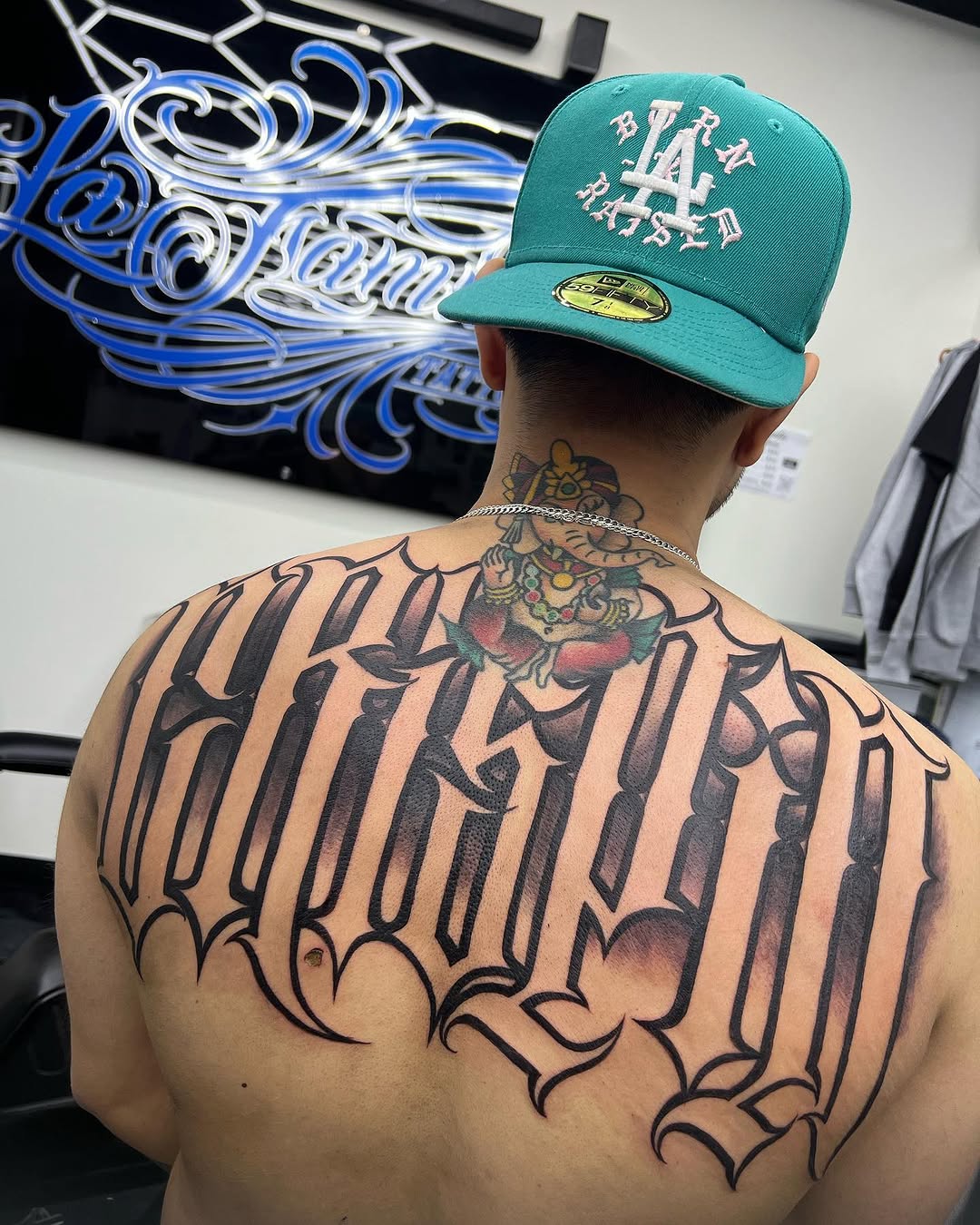 Tattoo by @playboy_script_ β lettering_script, blackwork