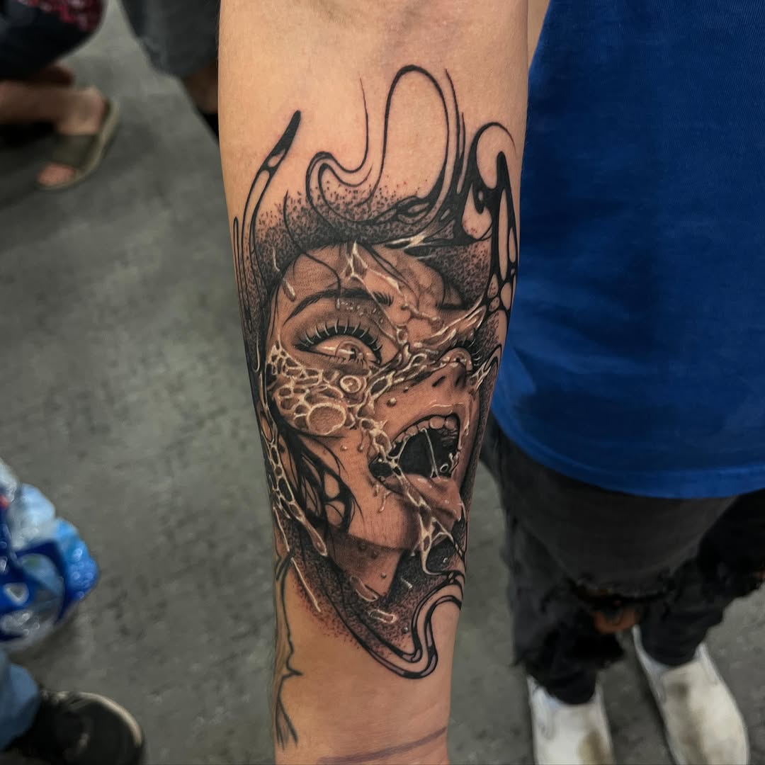 Tattoo by @inkedbycahela — black_and_grey, dark_realism