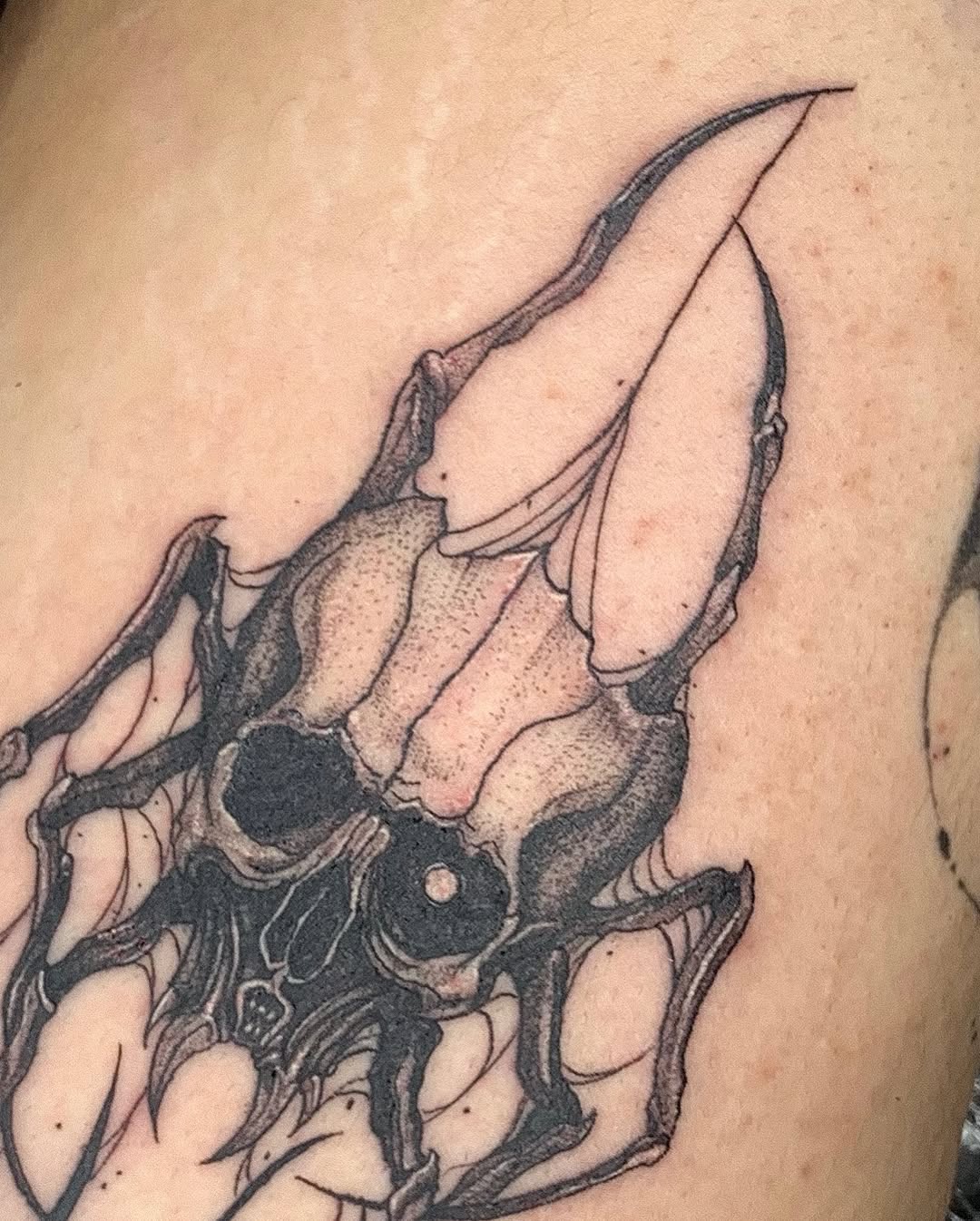 Tattoo by @gf.tattookorat — dark_realism, black_and_grey