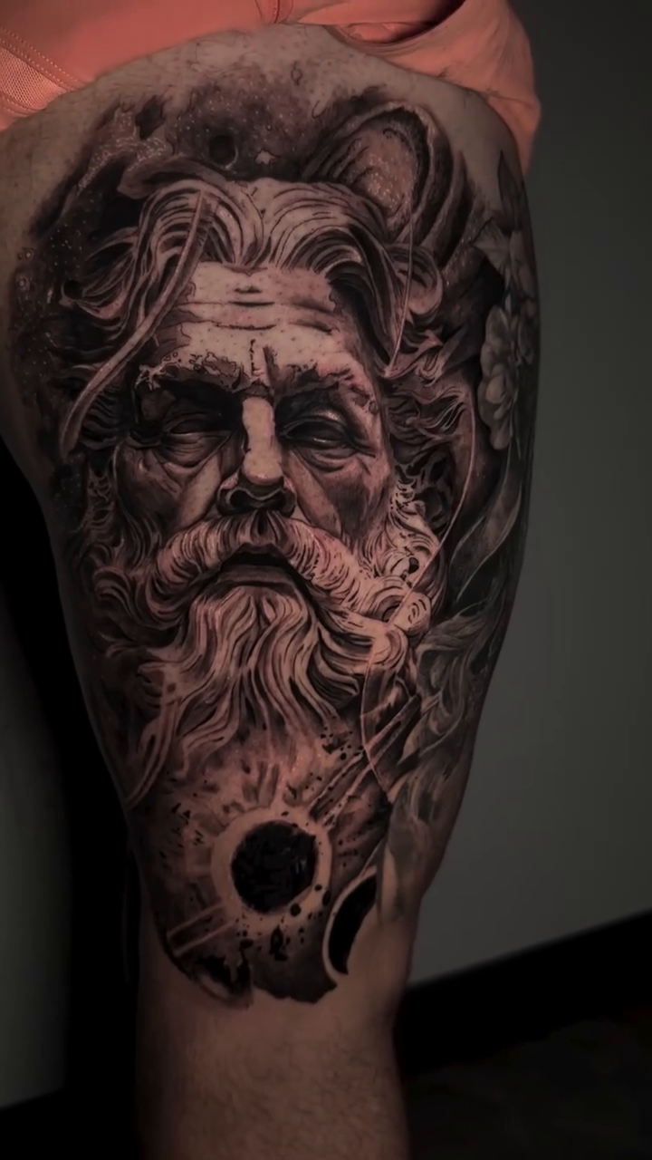 Tattoo by @blxck.edout — realism, black_and_grey