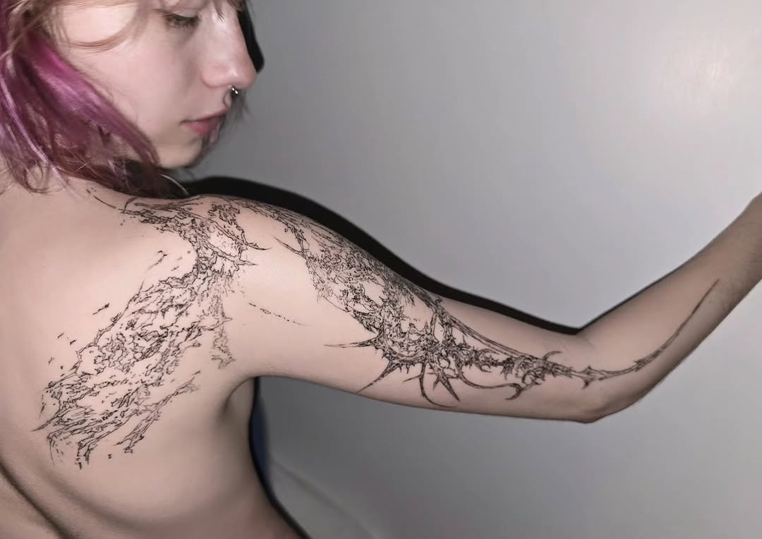 Tattoo by @godxear — blackwork, geometric