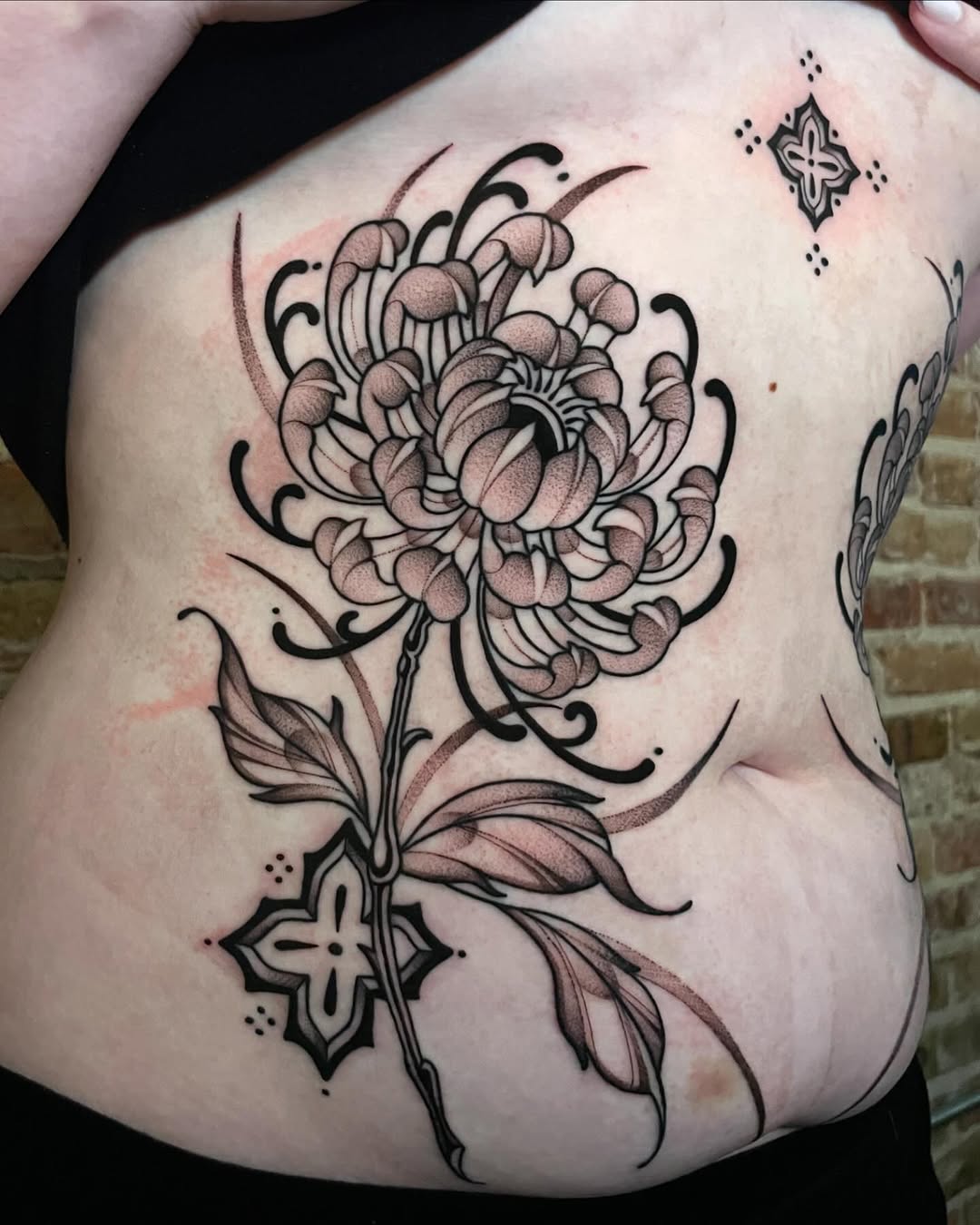 Tattoo by @strangegraves.ink — illustrative, black_and_grey